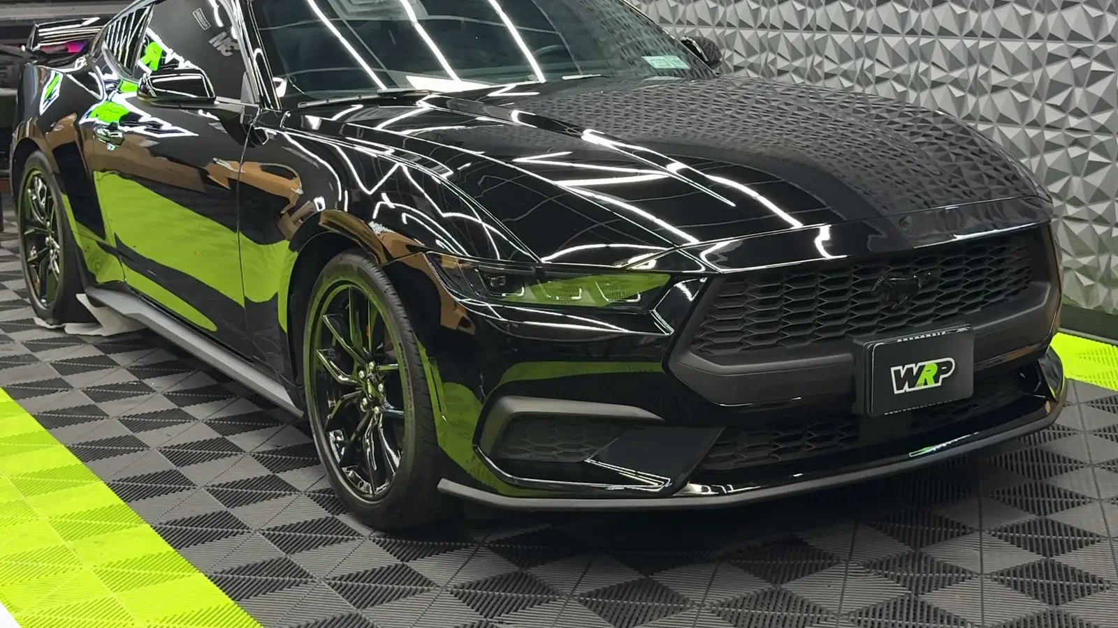 Gloss black Mustang after paint correction at WRP