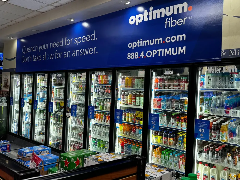 Optimum above-cooler wall graphics inside the station store